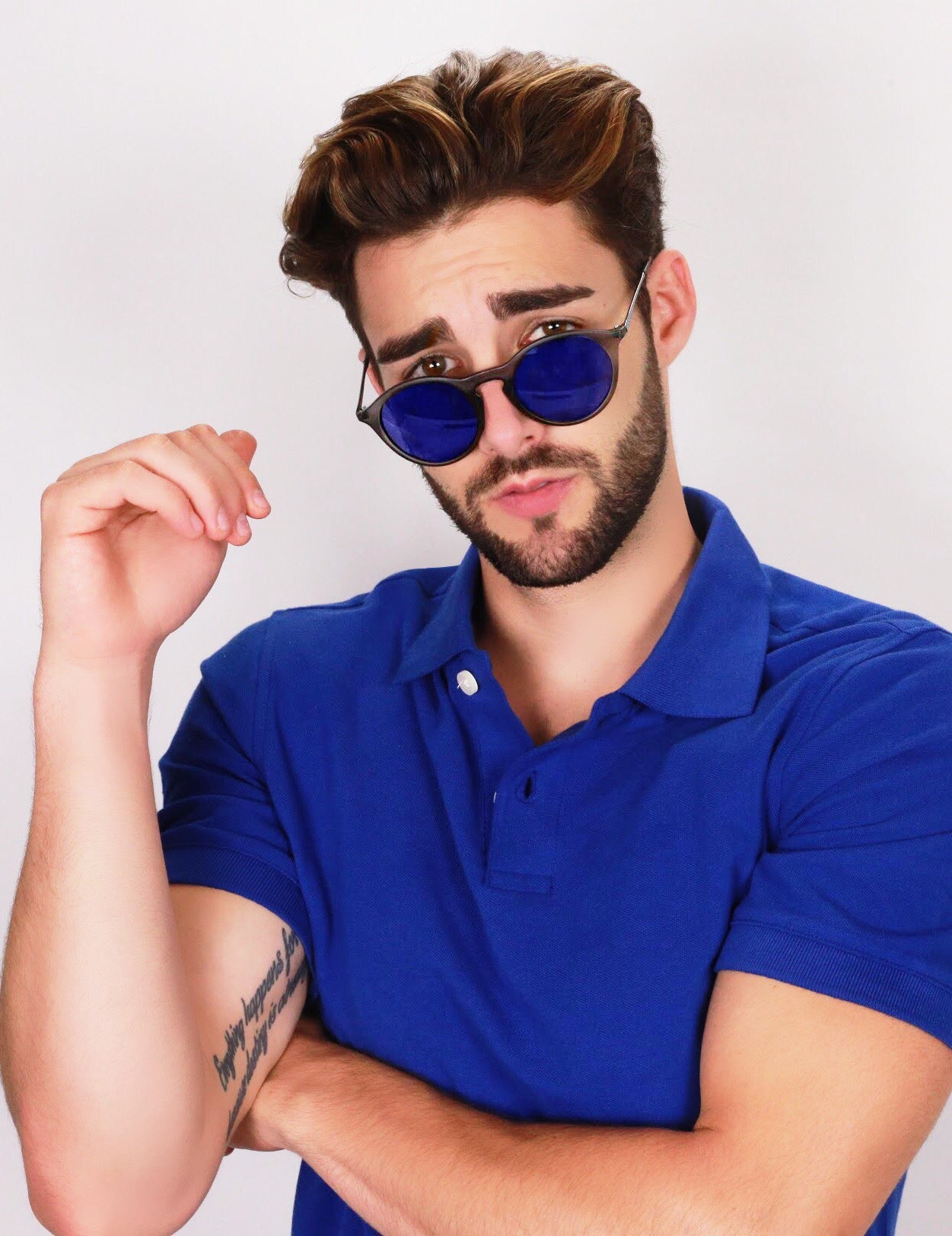Guy in blue shirt wearing blue lens Robin Ruth Carter sunglasses