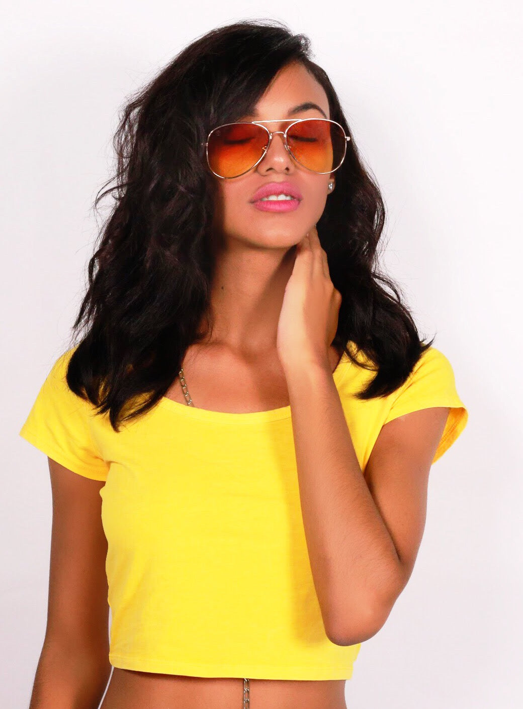 Girl wearing Orange Aguya Sunglasses