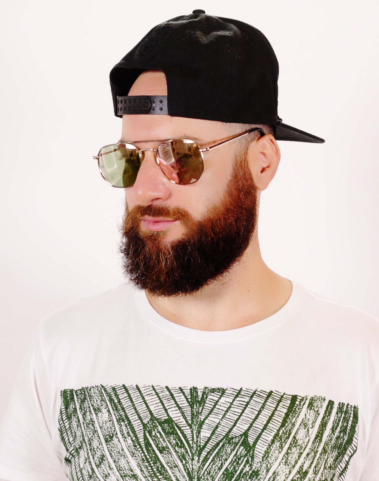 bearded Israeli man wearing brown princeton sun specs