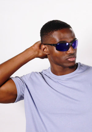 cool black guy wearing blue lens Rawling sunglasses